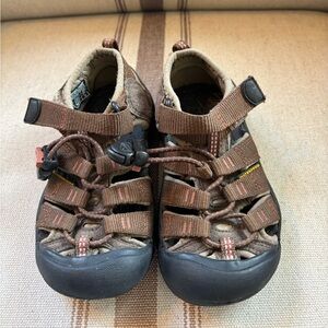 Keen Brown Sandals with Black Soles and perfectly protected toes.